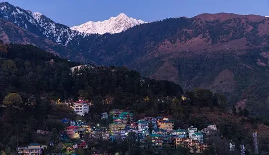 Dharamshala town view with colorful houses and mountain backdrop