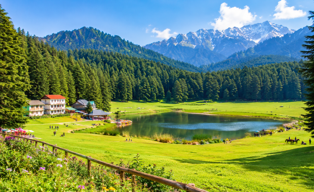 Khajjiar meadow and lake surrounded by green forests in Himachal Pradesh
